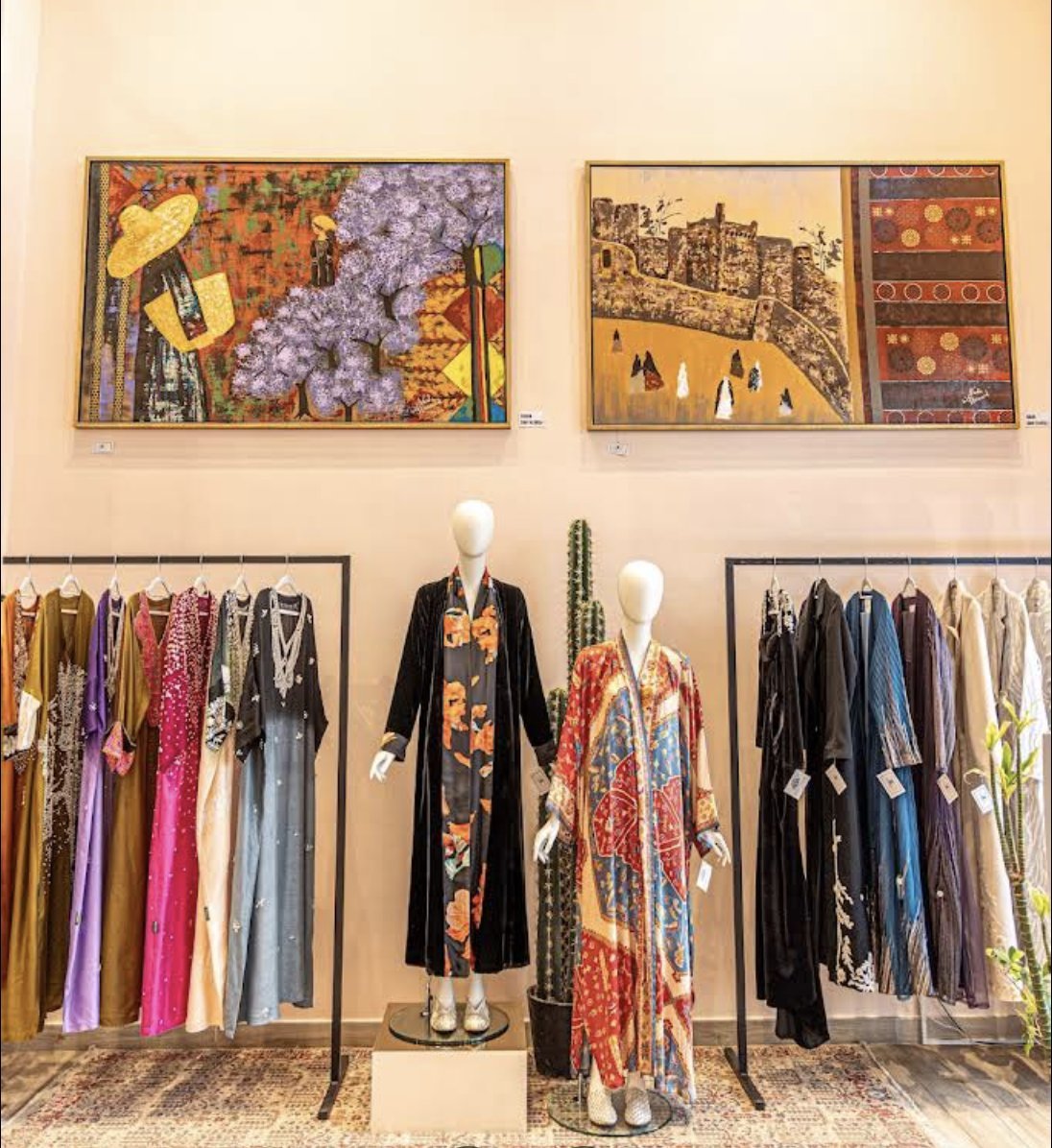 Interior of Mira Y Mano in Hittin, Riyadh, displaying original paintings by Nada Alowaid